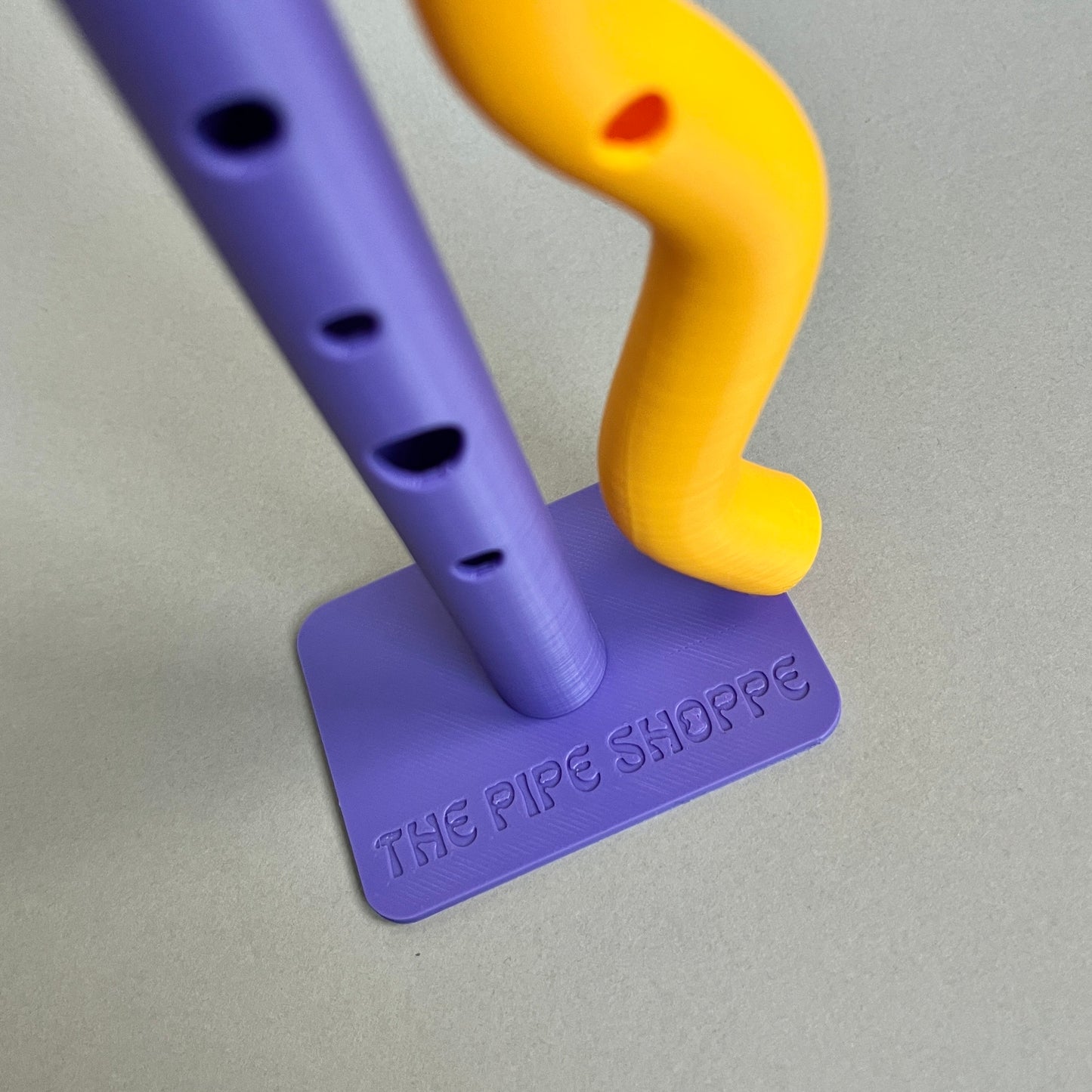 Wobbly Finger yellow purple